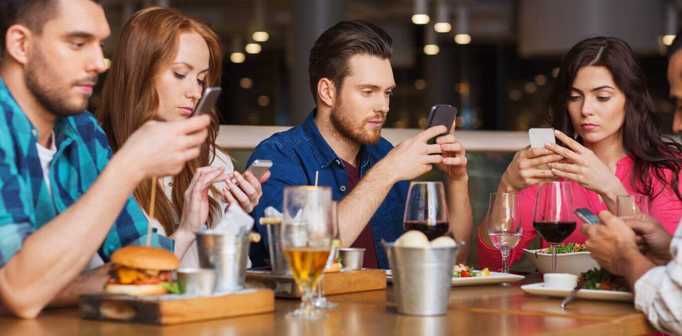 People on mobile devices People on mobile devices